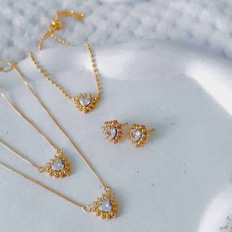 Brinco com coração central